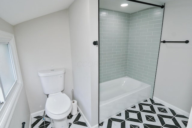 189 N Gould Rd, Bexley, OH 43209 - bathroom with toilet, bathtub / shower combination, baseboards, and tile patterned flooring