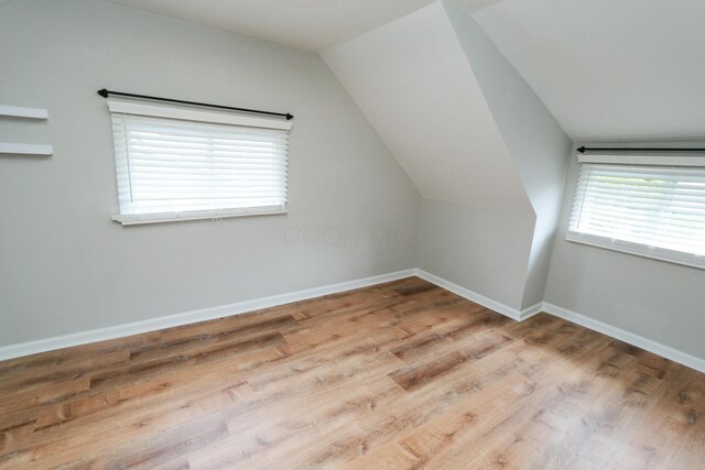 189 N Gould Rd, Bexley, OH 43209 - additional living space with wood finished floors, baseboards, and vaulted ceiling