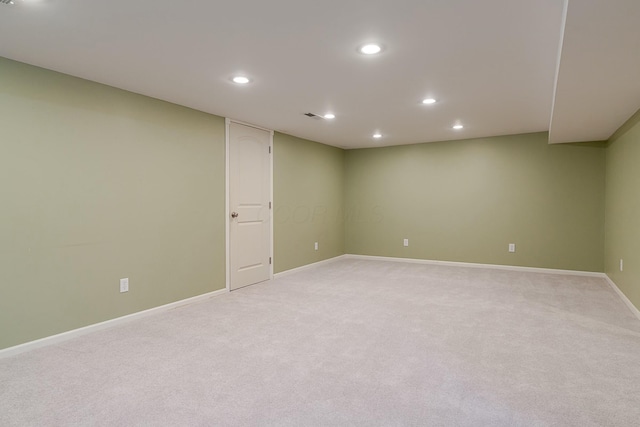 basement with light carpet