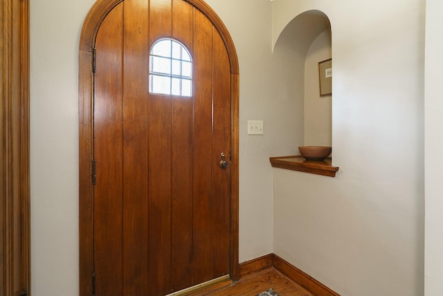 foyer entrance with hardwood / wood-style flooring