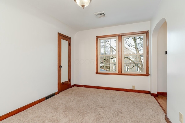 view of carpeted spare room