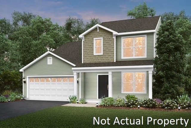 view of front facade with driveway, roof with shingles, and an attached garage