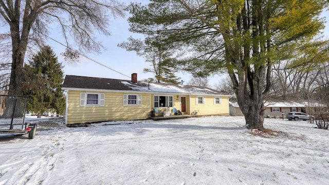 view of front of house with a trampoline