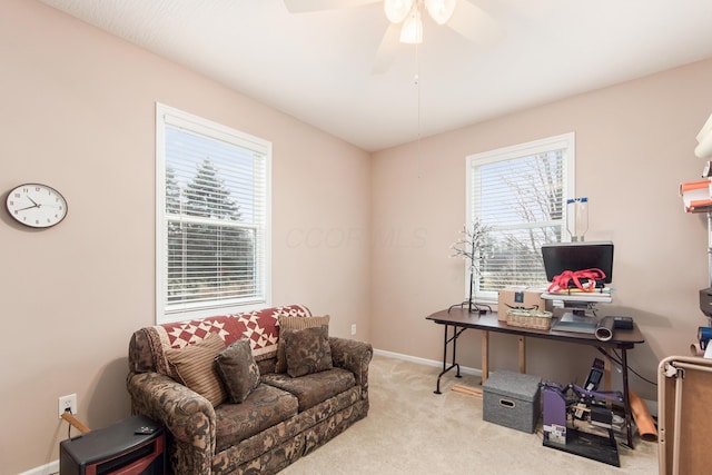 office with carpet, baseboards, and a ceiling fan