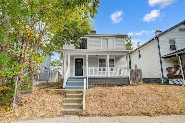 view of front property featuring a porch