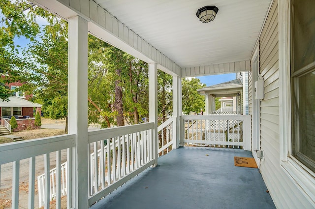 balcony featuring a porch