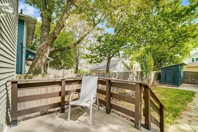 view of patio / terrace featuring a storage unit