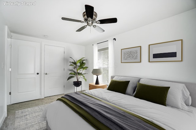 bedroom featuring ceiling fan