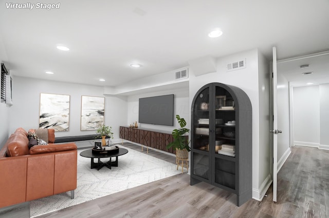 living room with hardwood / wood-style flooring