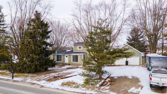 obstructed view of property featuring a garage