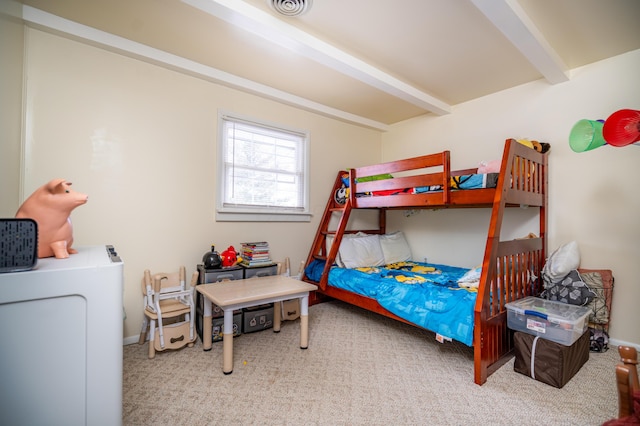 bedroom with carpet floors, beam ceiling, and visible vents