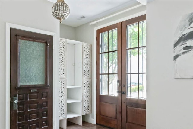 entryway featuring french doors and plenty of natural light