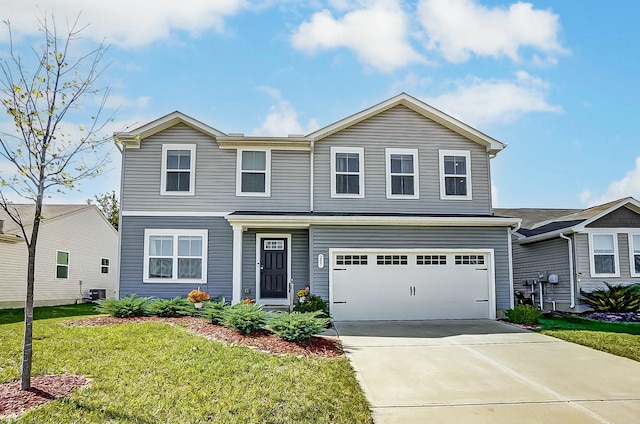 view of property with a garage, cooling unit, and a front yard