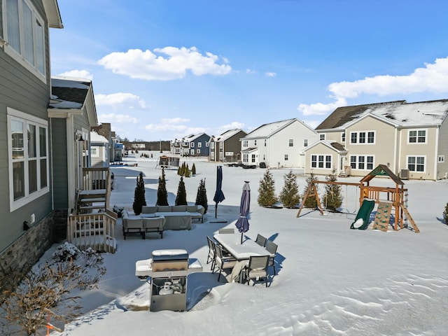 view of home's community with a residential view and a playground