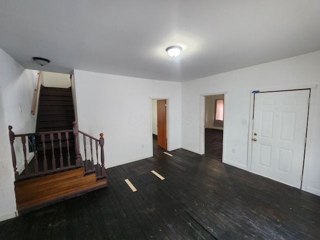 interior space with dark hardwood / wood-style flooring