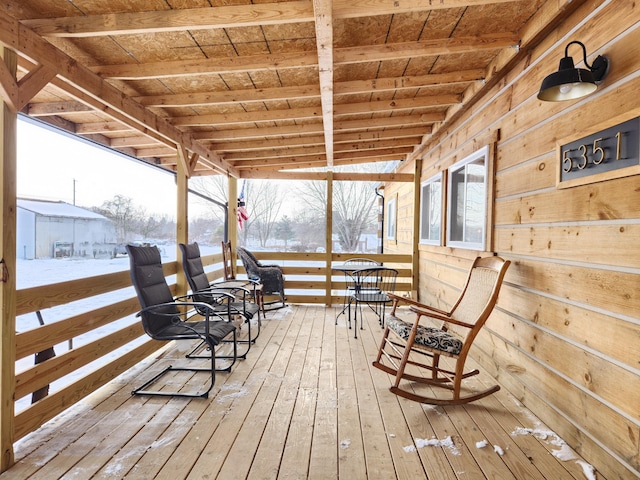 view of snow covered deck