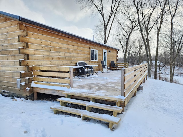 view of snow covered deck