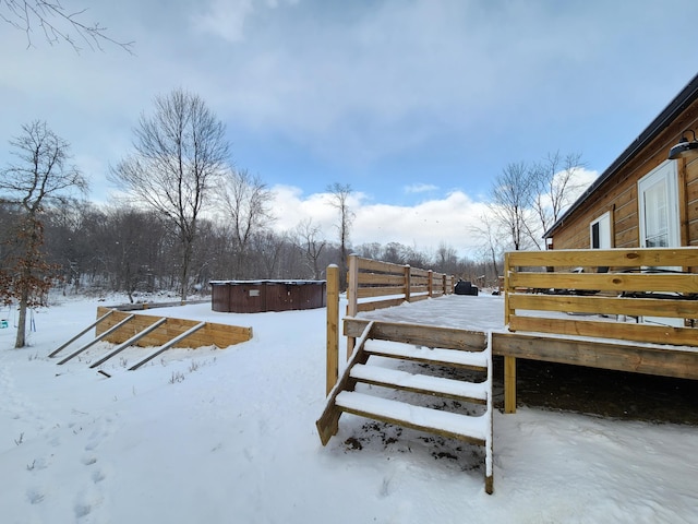 view of yard layered in snow