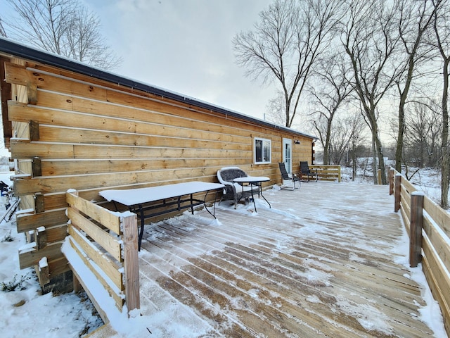 view of snow covered deck