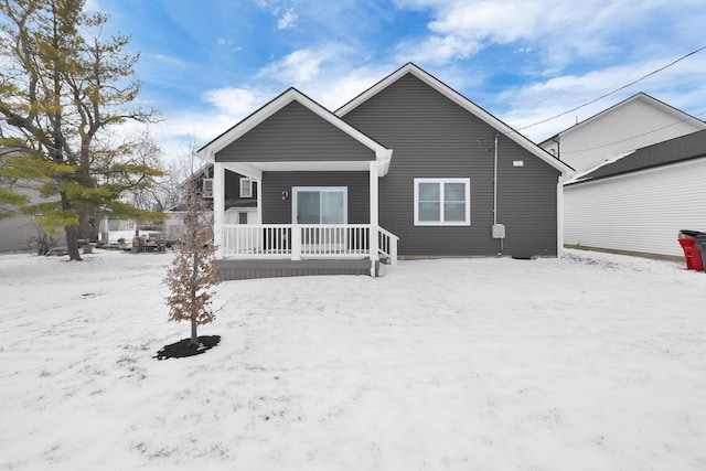 view of snow covered house