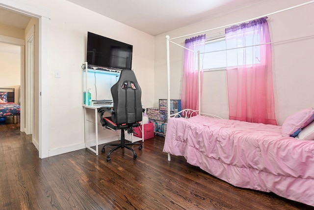 bedroom featuring dark hardwood / wood-style floors