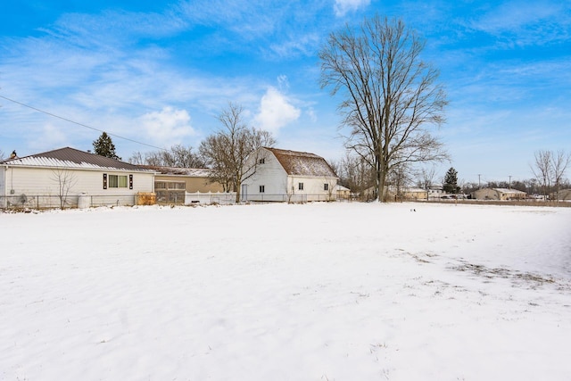 view of yard covered in snow