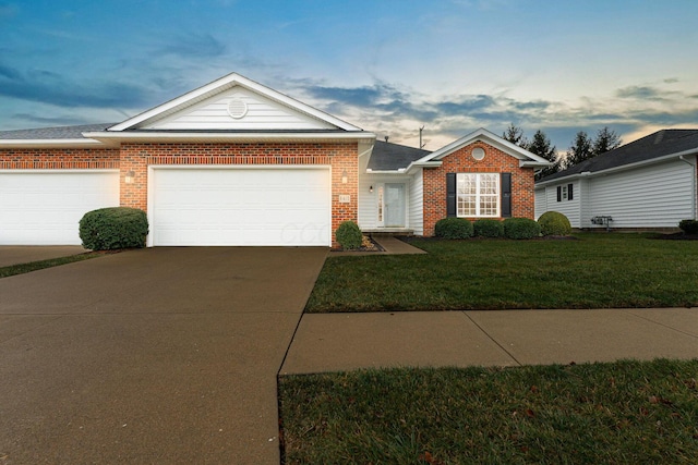 ranch-style house with a front lawn and a garage