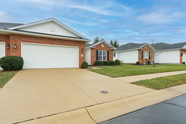 ranch-style home featuring a front lawn and a garage