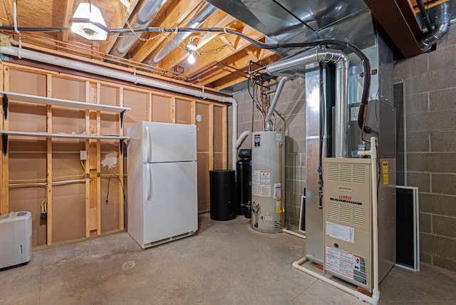 basement with gas water heater, heating unit, and white refrigerator