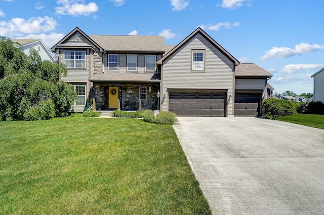 view of front facade featuring a garage and a front yard