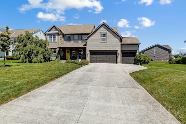 view of front of house featuring a front yard and a garage