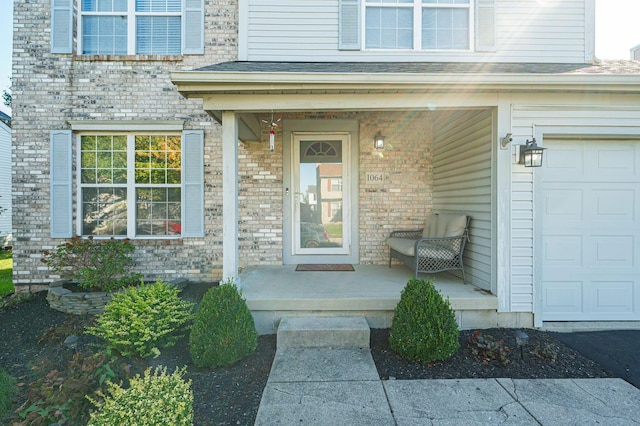 entrance to property featuring a garage