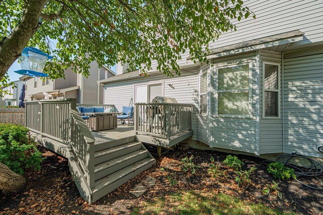 wooden deck with an outdoor hangout area