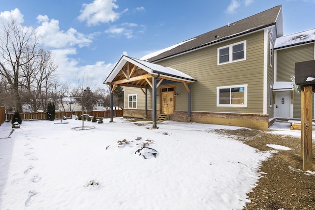 view of snow covered property