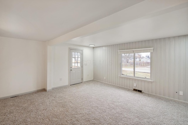 2029 Fairfax Ave, Columbus, OH 43207 - spare room featuring a wealth of natural light, visible vents, baseboards, and carpet