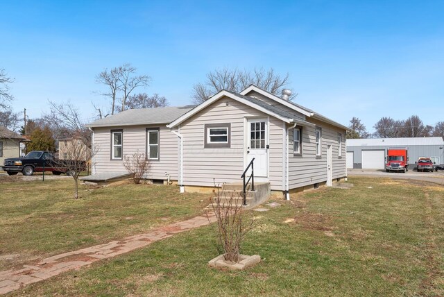 2029 Fairfax Ave, Columbus, OH 43207 - bungalow-style house with a front yard and an outdoor structure