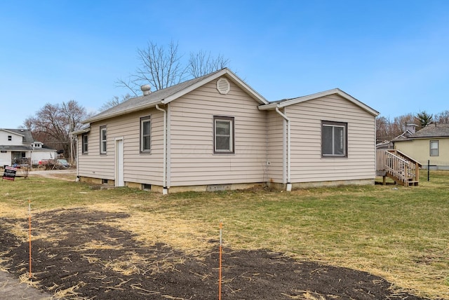 2029 Fairfax Ave, Columbus, OH 43207 - rear view of house featuring a lawn
