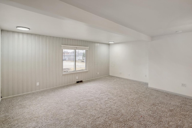 2029 Fairfax Ave, Columbus, OH 43207 - unfurnished room featuring beam ceiling, visible vents, baseboards, and carpet floors
