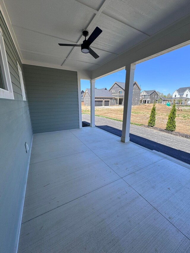 5450 Maple Dr, Lewis Center, OH 43035 - view of patio / terrace with a ceiling fan and a residential view