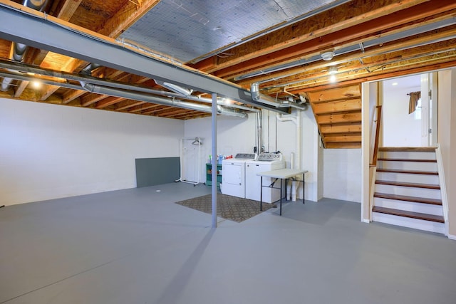 basement featuring washer and clothes dryer