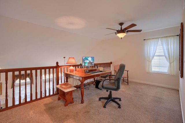 home office with light carpet, lofted ceiling, and ceiling fan