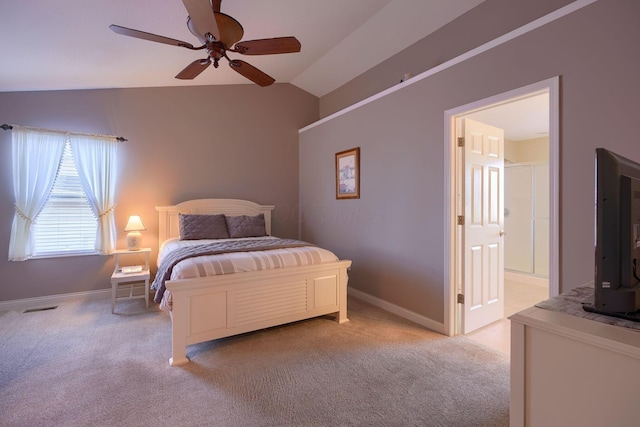 bedroom with light carpet, lofted ceiling, and ceiling fan