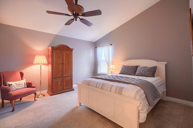 bedroom featuring carpet, lofted ceiling, and ceiling fan