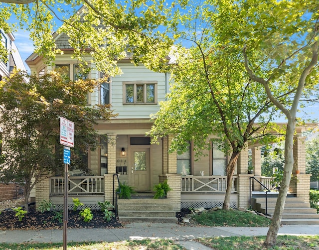 view of front of property featuring covered porch