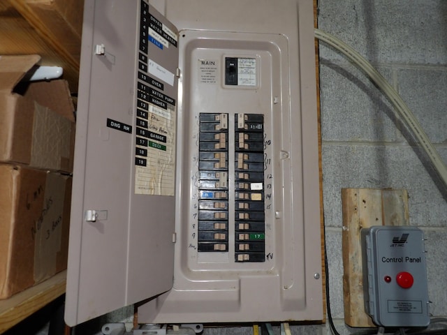 utility room featuring electric panel