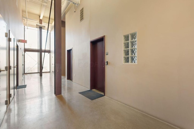 interior space with elevator and visible vents