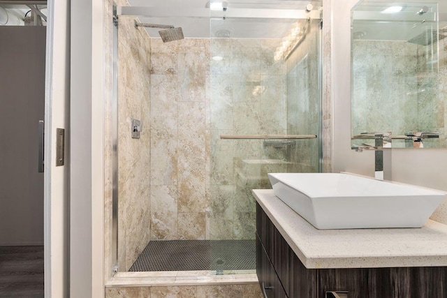 full bath featuring vanity and a stall shower