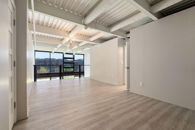 spare room featuring ceiling fan and wood finished floors