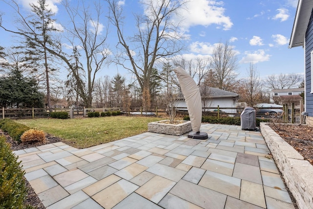 view of patio / terrace with fence