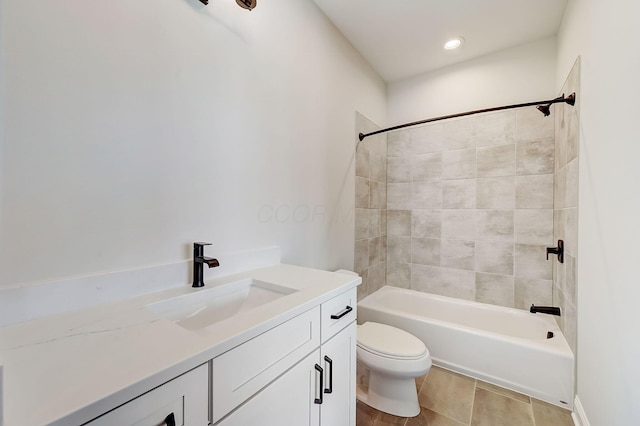 bathroom with toilet, shower / tub combination, and vanity